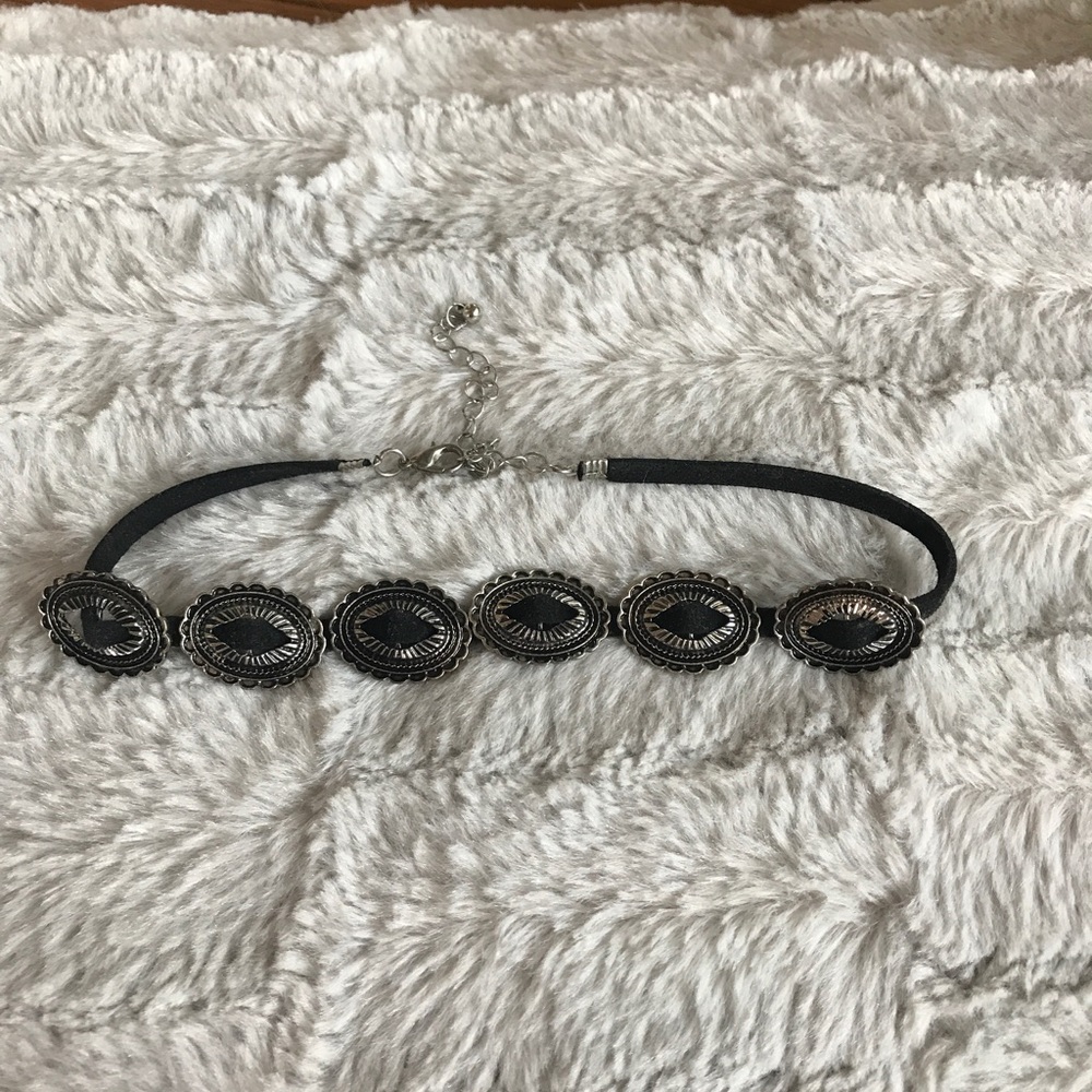 black choker with trendy buckle type things